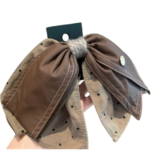 Polka dot fabric bow hair clip with brown faux leather and vintage gold button