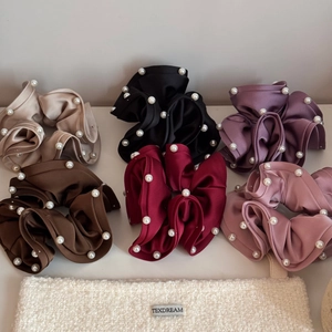French satin scrunchies set with pearl edges in various colors for elegant hairstyling