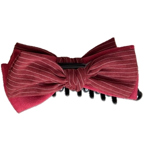 Elegante fermaglio per capelli con fiocco a righe rosse e bianche e pinza nera in plastica