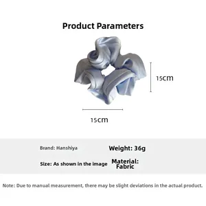 Detailed view of large light blue satin hair scrunchie showing 15cm size measurements