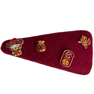 Burgundy felt hair clip with golden Chinese luck symbols and Caishen charms