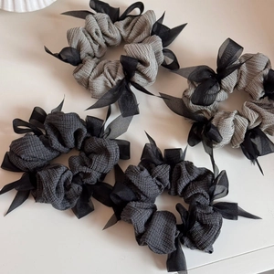 Set of 4 large hair scrunchies with black and white stripes and ribbon bows