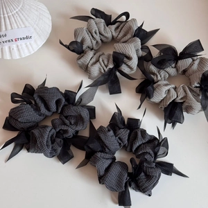 Elegant grey striped and plaid ribbon bow scrunchies set on a clean white background
