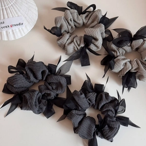 Set of four elegant plaid and striped bow hair scrunchies with sheer black mesh ribbons