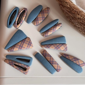 Plaid and blue fabric hair clips set in various geometric shapes for women's hair styling