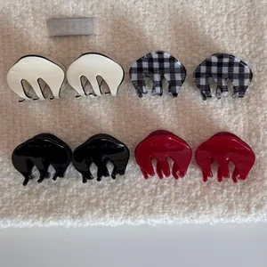 Set of four small cloud-shaped hair claws in checkered and solid colors for half-up hair