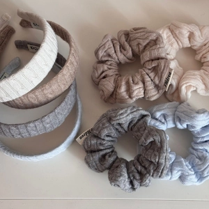 Knitted cable pattern headbands and scrunchies set in beige, grey, and blue colors