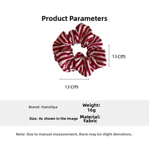 Detail view of 13cm red and white striped fabric scrunchie with high elasticity