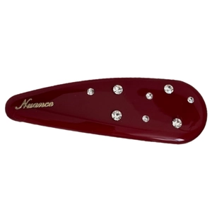 Elegant deep red rhinestone snap hair clip with gold Nuance branding on white background
