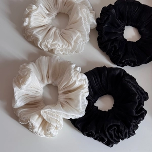 Elegant pleated oversized hair scrunchies in black and cream white satin fabric