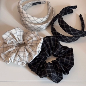 Retro black and white checkered headband and scrunchie set in minimalist fabric style