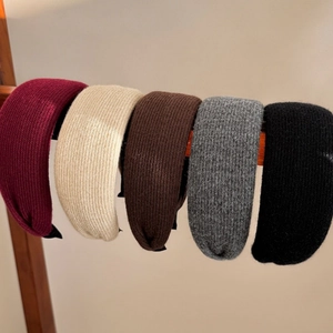Detailed set of five ribbed knit headbands in burgundy, beige, brown, grey and black colors