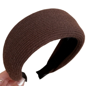 Wide striped knitted headband in dark brown with textured thick fabric for daily hair styling