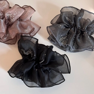 Three-piece set of sheer scrunchies with fine silver sequins in pink, grey, and black