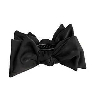 Elegant large black satin bow hair clip with multi-layer folding design for women hair