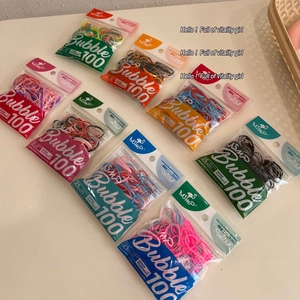 Detail view of colorful high elastic hair ties in eco-friendly 100-piece packaging bags