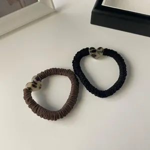 Elegant leopard print heart scrunchies in black and brown pleated fabric 2-piece set