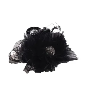 Elegant black hair claw clip with ostrich feathers, mesh bow, and crystal embellishment