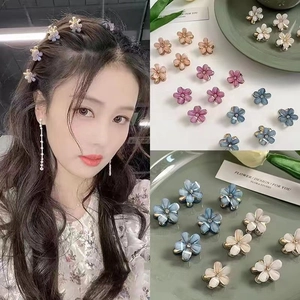 Détails de mini pinces à cheveux fleur avec effet œil de chat et cristaux brillants