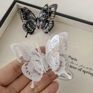 Elegant vintage 3D layered butterfly hair clips with silver glitter finish for women