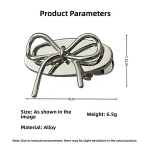 Detail showing 4cm silver metal bow hair clip with technical dimensions and 6.5g weight