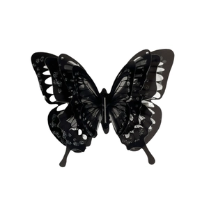 Elegant 3D butterfly hair clip with layered black wings and silver glitter accents