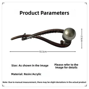 Detail view of pearl twist hair clip with dimensions 10.5cm by 2.5cm and 11g weight