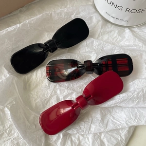 Three-piece Korean bow hair clip set in black, red plaid, and deep red acetate
