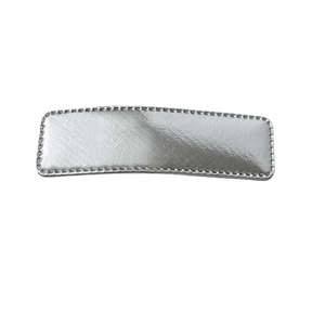 Sleek silver leather rectangle hair clip with beaded edges and metallic texture surface