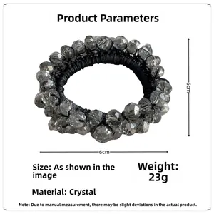 Detailed view of a 6cm gray crystal beaded hair tie with dimensions and weight specs
