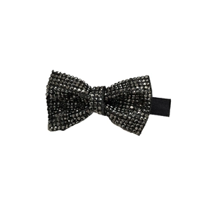 Elegant black bow hair clip with dark sparkling rhinestones on white background