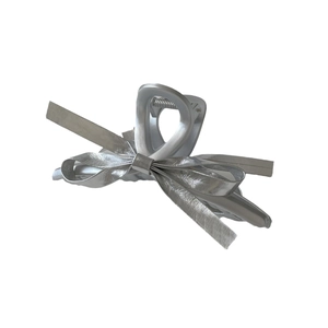 Elegant silver bow hair claw clip with matte metallic finish for minimalist hairstyles