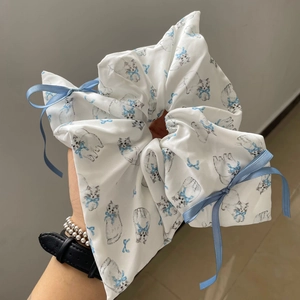 Oversized white satin hair scrunchie with blue cat prints and decorative ribbon bows