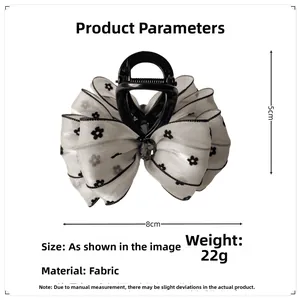 Detailed size view of the 8x5cm black floral fabric bow hair claw clip with weight info