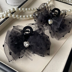 Sweet polka dot tulle bow hair claw clip with a sparkling heart rhinestone detail