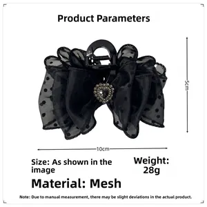 Detailed specs of black polka dot mesh hair claw clip with crystal heart decor, 28g weight