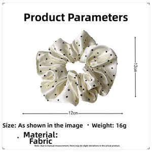 Detailed specs showing a 12cm cream polka dot satin scrunchie weighing 16g