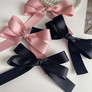Set of four French vintage satin bow hair clips in pink and black with long ribbons