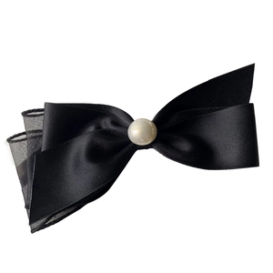 Elegant black satin bow hair clip with a center pearl detail for a refined woman's style