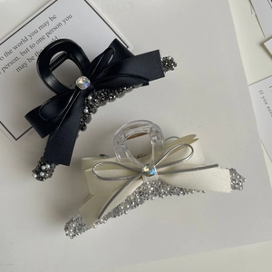 Elegant satin bow hair claws with sparkling rhinestones and pearls in black and off-white