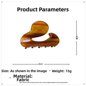 Brown tortoiseshell hair claw clip detail with 6cm length and 4cm height dimensions