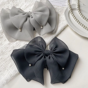 Vintage polka dot chiffon bow hair claw clips with pearls for elegant French updo hairstyles