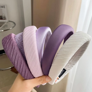 Set of wide satin headbands in romantic purple and white hues with handmade fabric texture