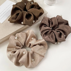 Three-piece set of satin silk scrunchies with pearls in brown, coffee, and champagne colors