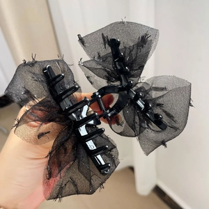 Pince à cheveux élégante avec double nœud en maille noire et franges pour femmes styles