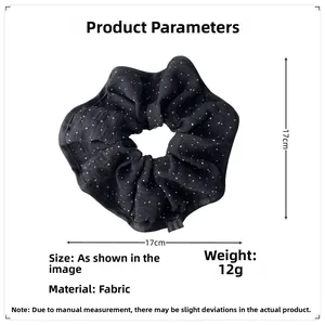Detailed size chart showing the 17cm diameter of the black polka dot fabric scrunchie