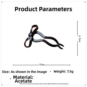 Detailed view of 10cm acetate ballet bow hair fork pin in tortoise shell finish