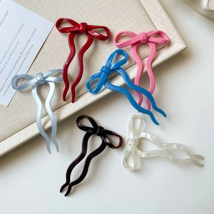 Elegant ballet style bow hair pins in six assorted colors with wavy double-tooth design