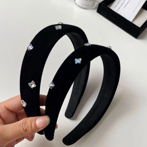 Elegant black velvet padded headband with sparkling crystal butterfly embellishments