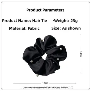 Detailed size parameters of 14cm black satin scrunchie with white pearl accents